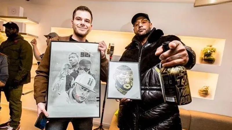 Cédric Rémia en compagnie de Booba.