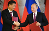 Poutine et Xi préparent leur évasion de SWIFT